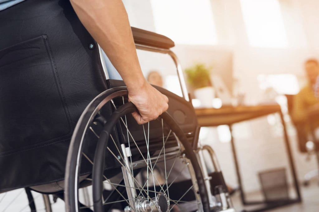 Person in wheelchair in a doctor's office
