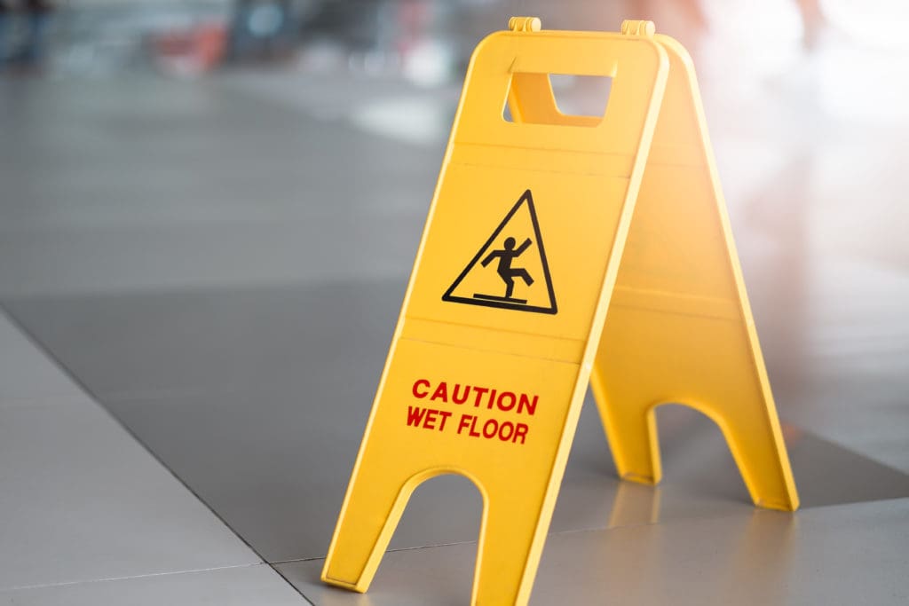 Proper signage can be vital in preventing slip and fall accidents.