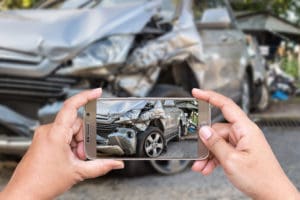 picture evidence on smart phone for an Upper Marlboro Car Accident Attorney