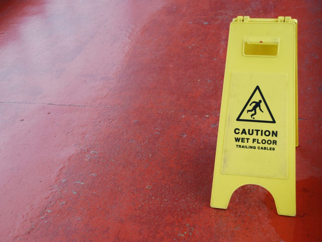 Proper signage is vital in preventing slip and fall injuries